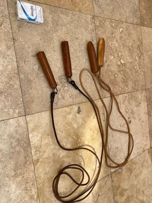 vintage pair of leather skipping rope skipping ropes wood handle