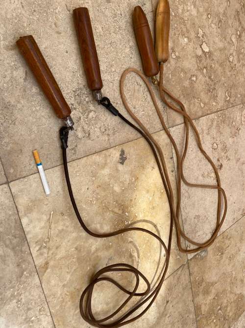 vintage pair of leather skipping rope skipping ropes wood handle