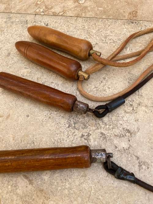 vintage pair of leather skipping rope skipping ropes wood handle
