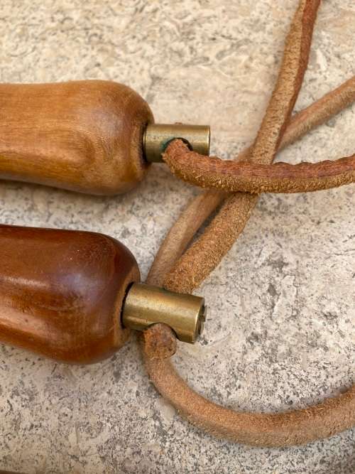 vintage pair of leather skipping rope skipping ropes wood handle