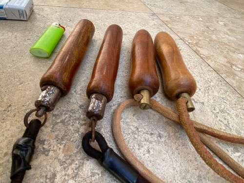 vintage pair of leather skipping rope skipping ropes wood handle