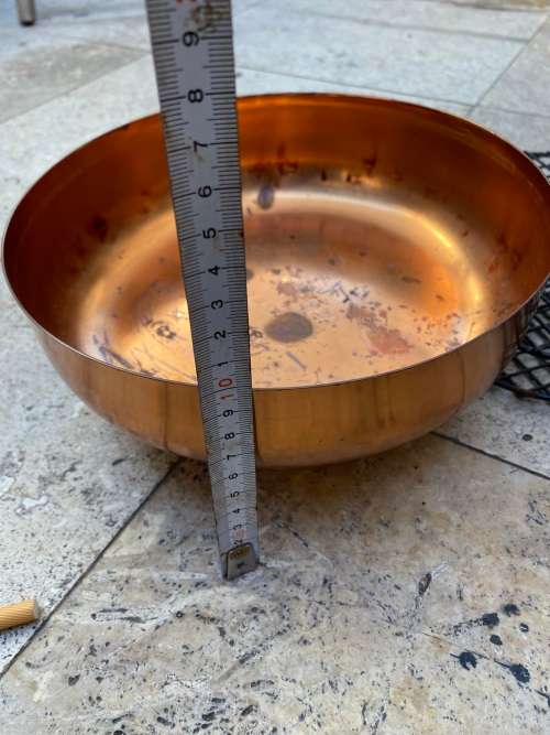 copper round footed vase with frog grate