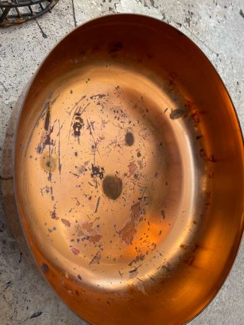 copper round footed vase with frog grate