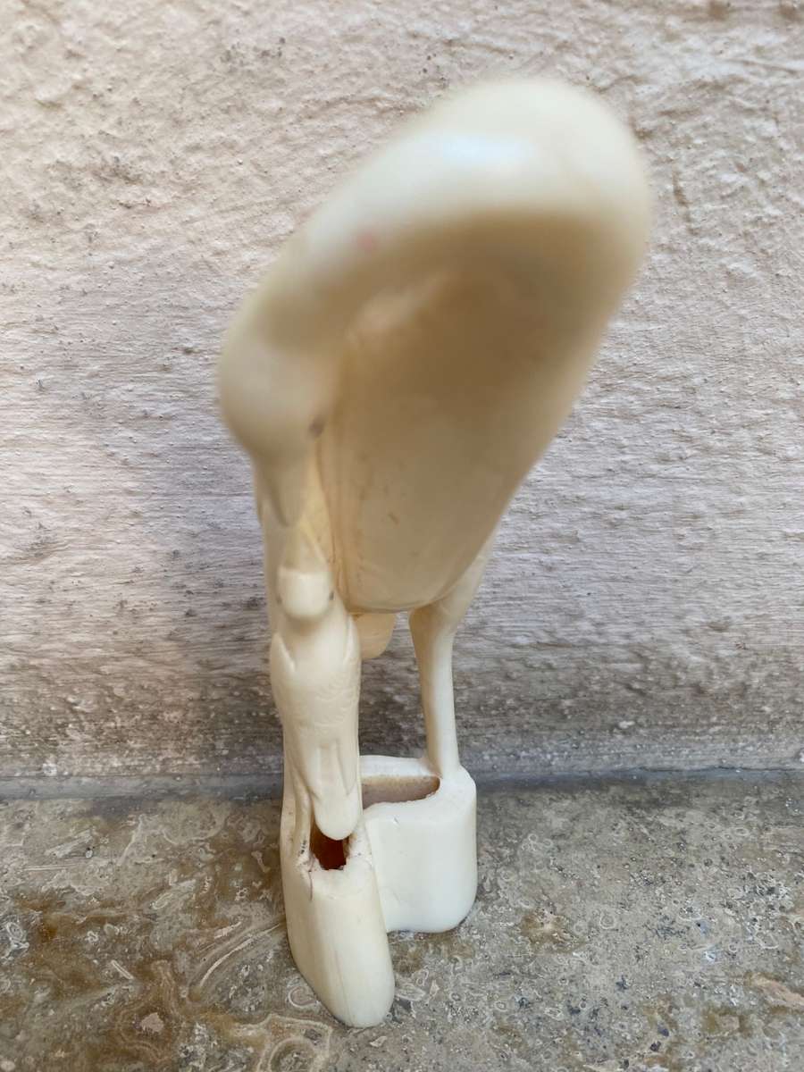 Vintage hand carved bone heron crane bird mother and baby bird feeding figurine