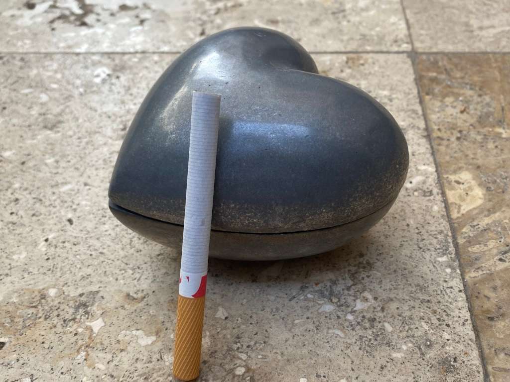 Vintage heart shaped trinket box India with old Bakelite poker dice