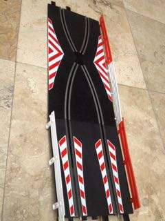 Ninco Slot Car Accessories , crossing and narrowing tracks plus barriers