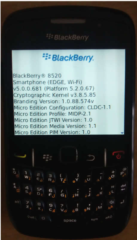 VINTAGE BlackBerry 8520 Cell phone with charger, a usb cable and ear phones