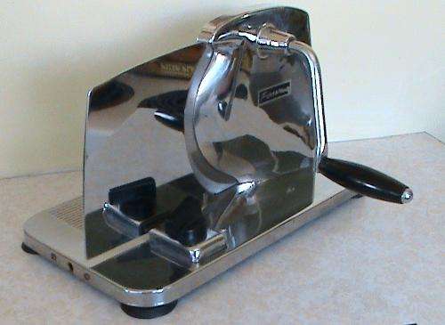 Pineware Food Slicer with adjustable S/S 190mm diameter serrated blade.