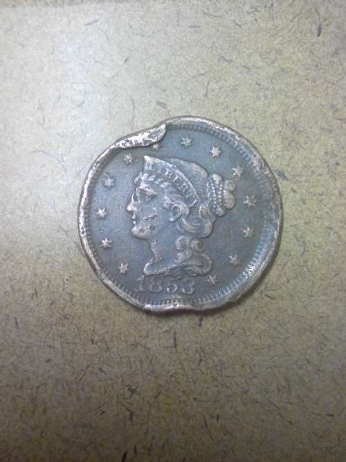 A SCARCE 1853 USA ONE CENT  COIN - RIM DAMAGED