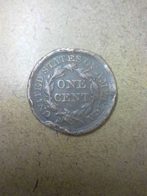 A SCARCE 1853 USA ONE CENT  COIN - RIM DAMAGED