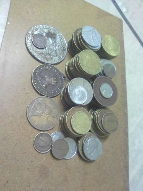 115 COINS - international coins but mostly South African big 1/2c and pennies - BID PER COIN