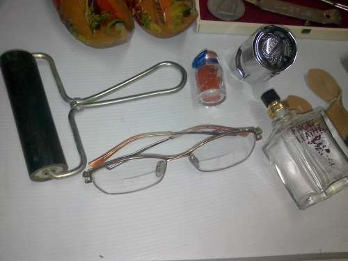 COLLECTABLE ITEMS - sheep bells, wooden Holland shoes, large silver Dias token, and other nice item