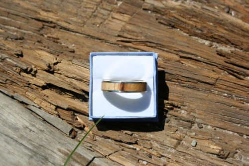 Handmade 925 Sterling silver & Wild Olive wood ring