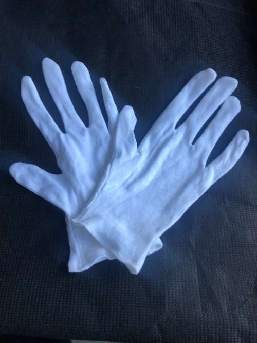 white cotton gloves.