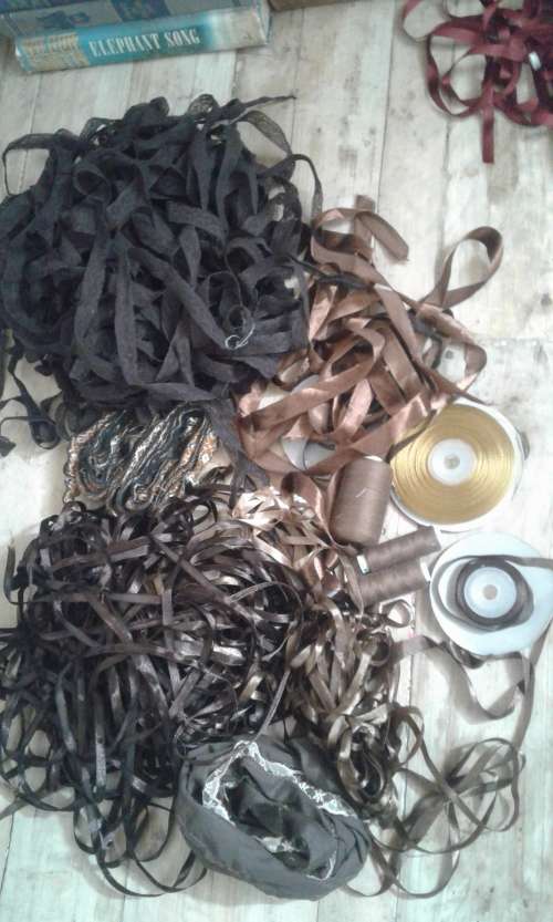 A lot of brown ribbons, quality laces and cotton