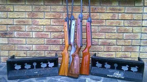 Air Rifles (4) and 2 self re-setting metal target traps