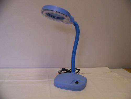 Magnifier reading lamp.
