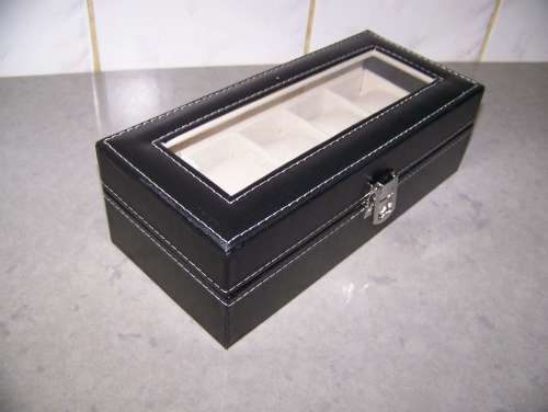 Leatherette watch display holds 5 watches