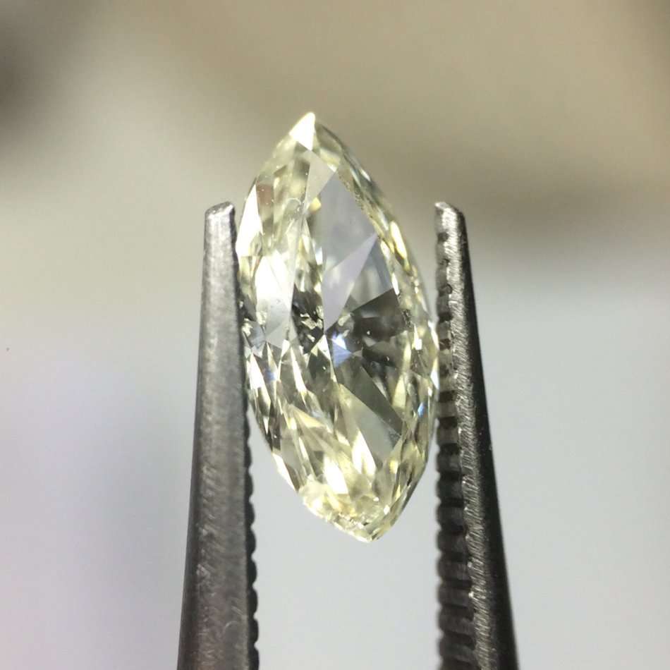 0.53 carat M I1 marquise diamond Gia certified