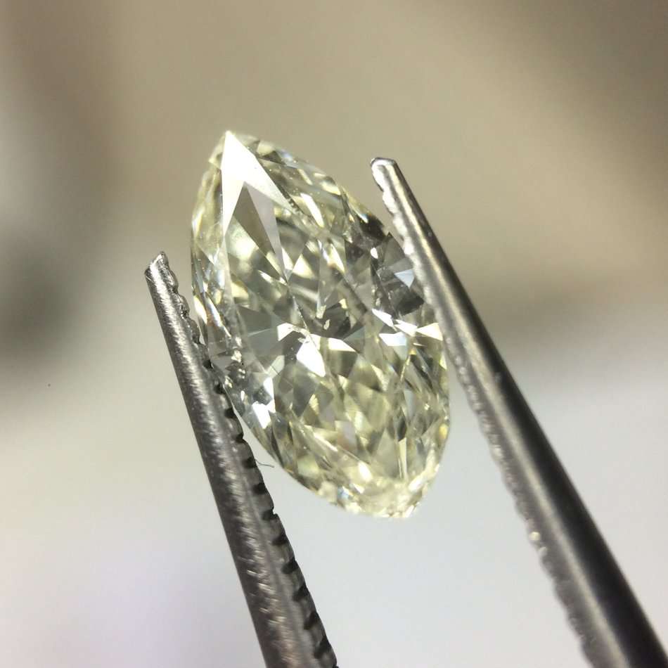 0.53 carat M I1 marquise diamond Gia certified