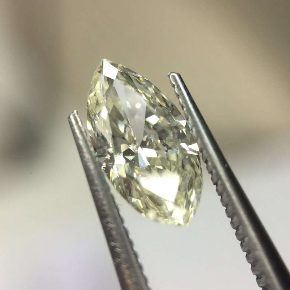 0.53 carat M I1 marquise diamond Gia certified