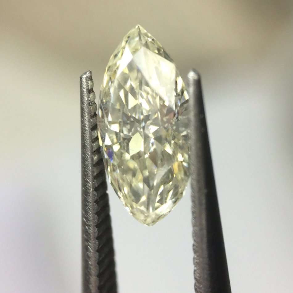 0.53 carat M I1 marquise diamond Gia certified