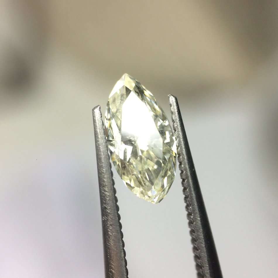 0.53 carat M I1 marquise diamond Gia certified