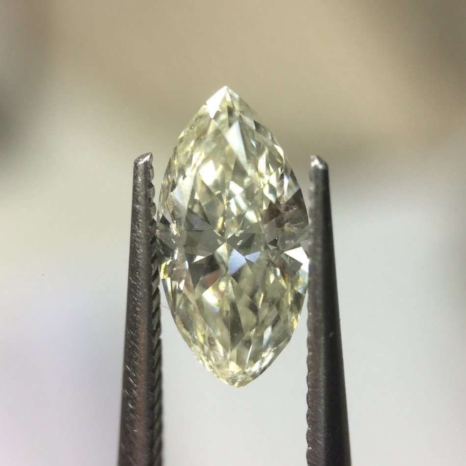 0.53 carat M I1 marquise diamond Gia certified