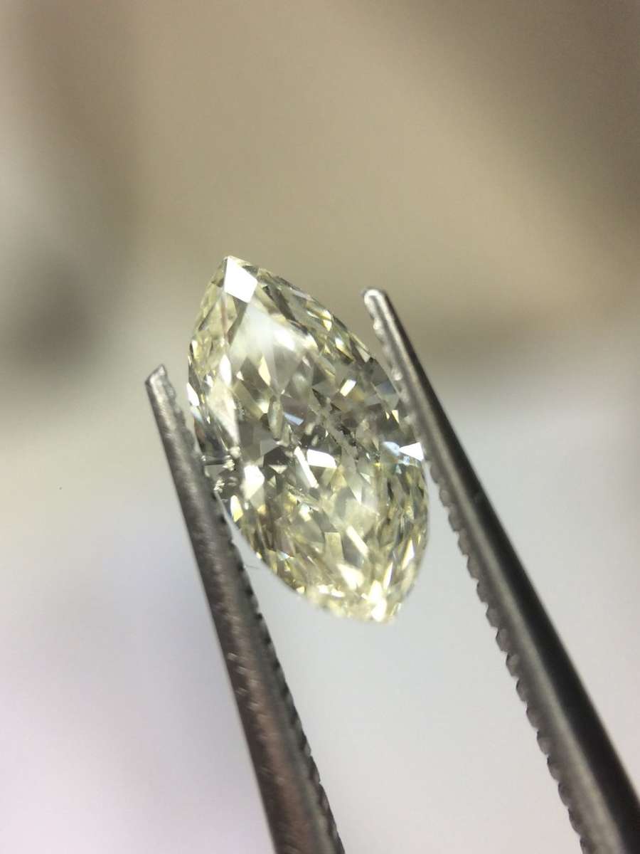 0.53 carat M I1 marquise diamond Gia certified