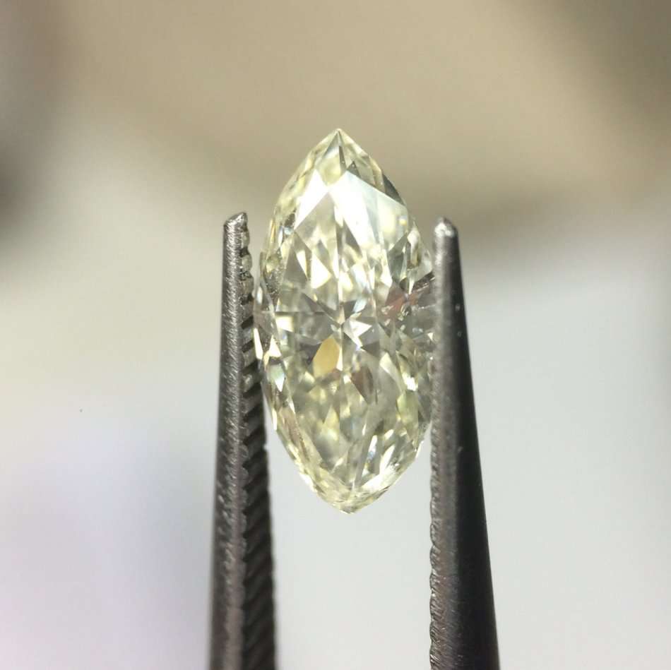 0.53 carat M I1 marquise diamond Gia certified