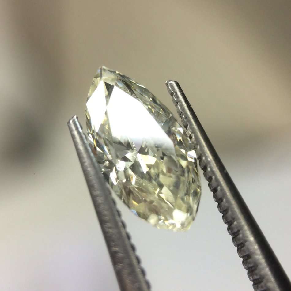 0.53 carat M I1 marquise diamond Gia certified