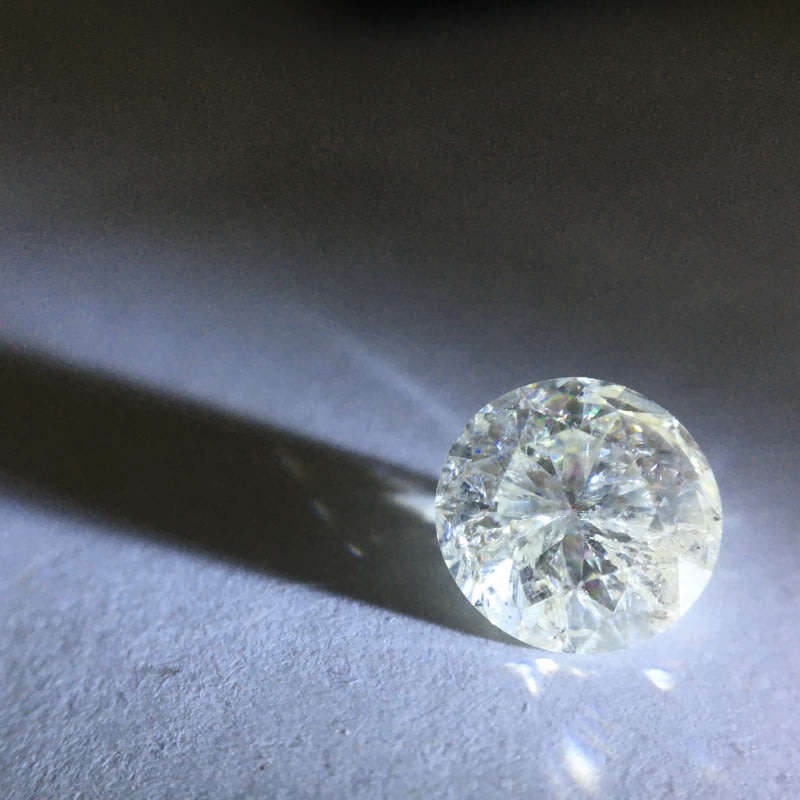 1.12 ct Cape pique round brilliant diamond