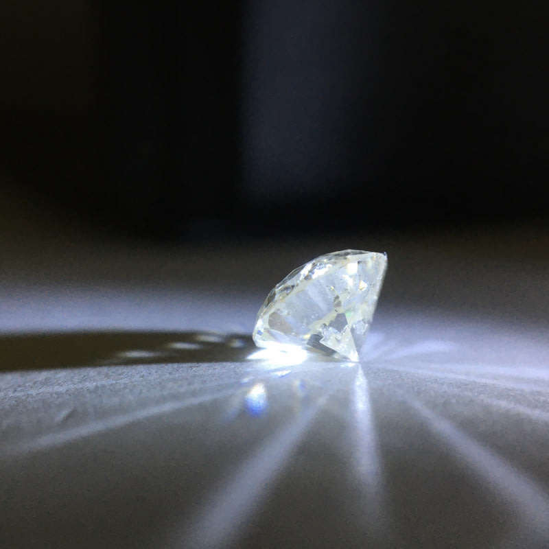 1.12 ct Cape pique round brilliant diamond