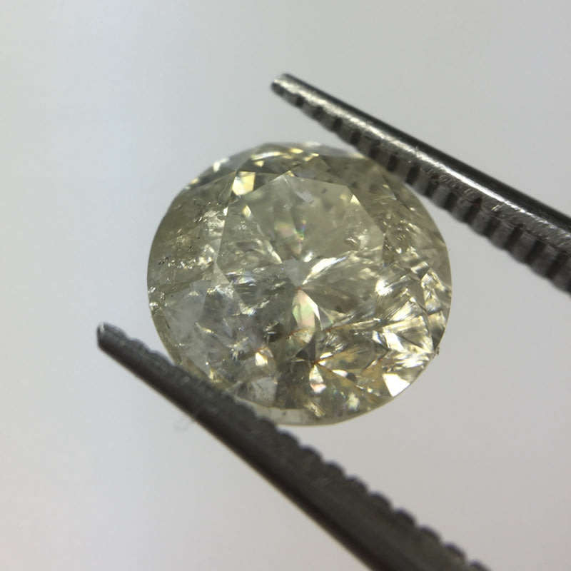 1.12 ct Cape pique round brilliant diamond