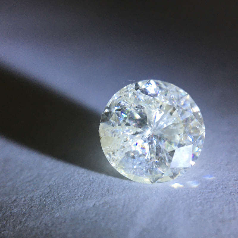 1.12 ct Cape pique round brilliant diamond