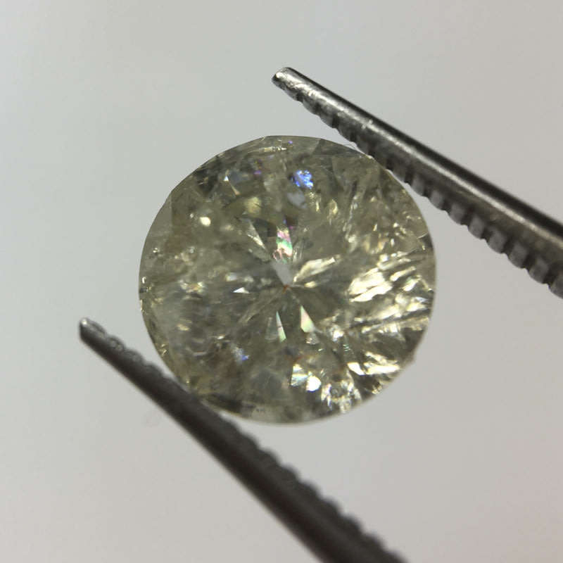 1.12 ct Cape pique round brilliant diamond