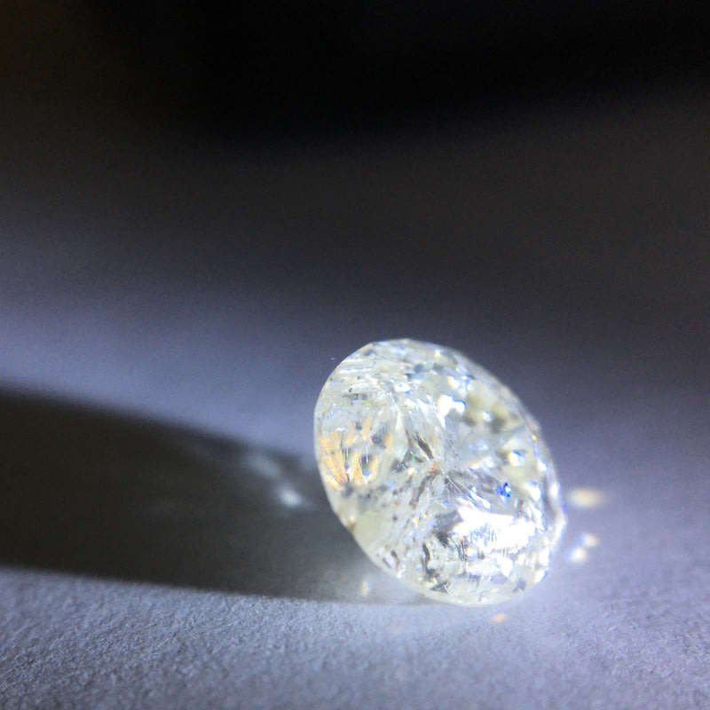 1.12 ct Cape pique round brilliant diamond