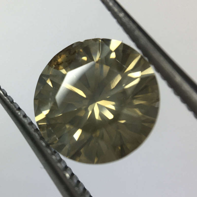 1.16 Cape Yellow Pique round brilliant diamond