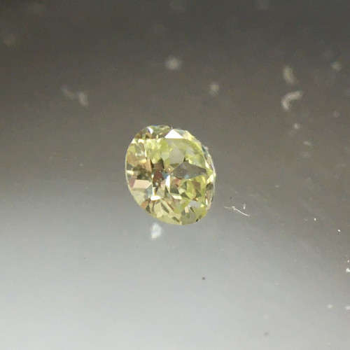 0.04 ct Fancy Yellow Green I1 Round Brilliant Diamond