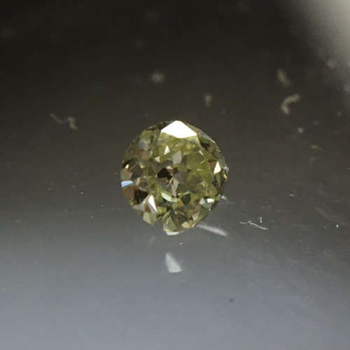 0.04 ct Fancy Yellow Green I1 Round Brilliant Diamond