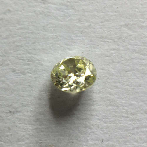 0.04 ct Fancy Yellow Green I1 Round Brilliant Diamond