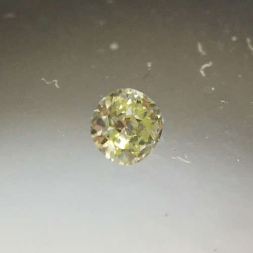 0.04 ct Fancy Yellow Green I1 Round Brilliant Diamond