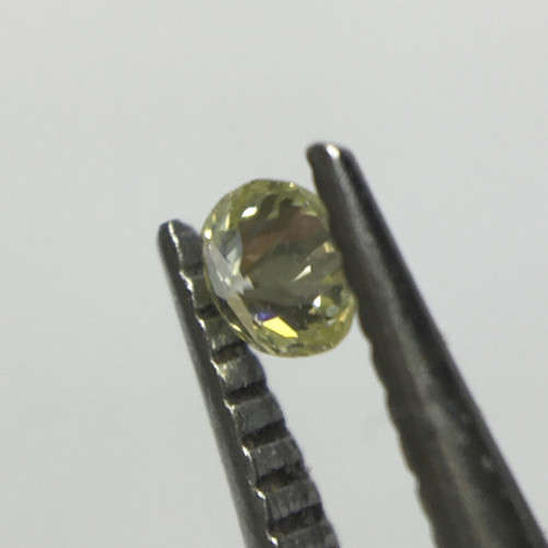0.04 ct Fancy Yellow Green I1 Round Brilliant Diamond