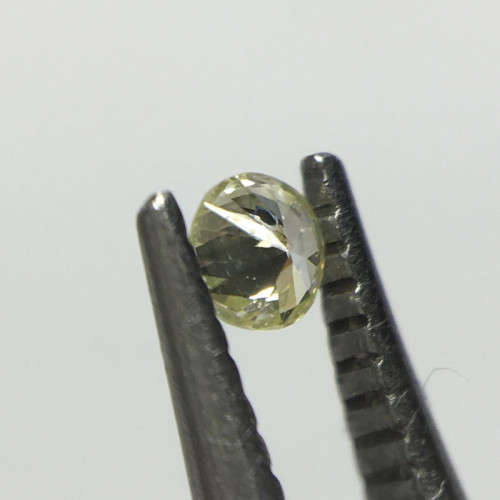 0.04 ct Fancy Yellow Green I1 Round Brilliant Diamond