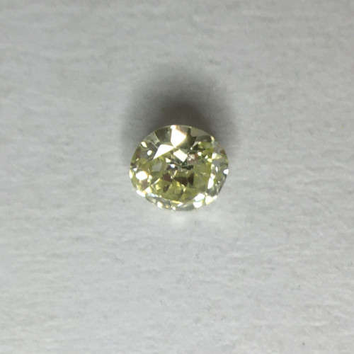 0.04 ct Fancy Yellow Green I1 Round Brilliant Diamond