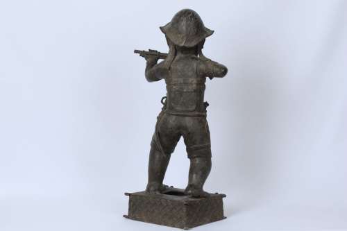 Brass figure of a Portuguese soldier holding a musket - Benin Nigeria