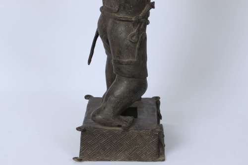 Brass figure of a Portuguese soldier holding a musket - Benin Nigeria