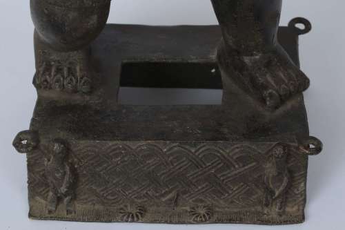 Brass figure of a Portuguese soldier holding a musket - Benin Nigeria