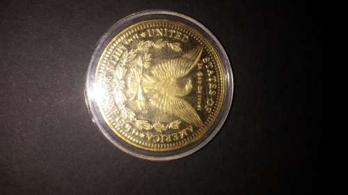 .999 USA 100 mills gold clad