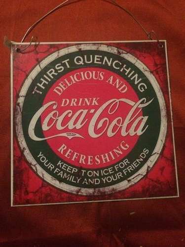 Old Coca-Cola Sign on Steel Plate